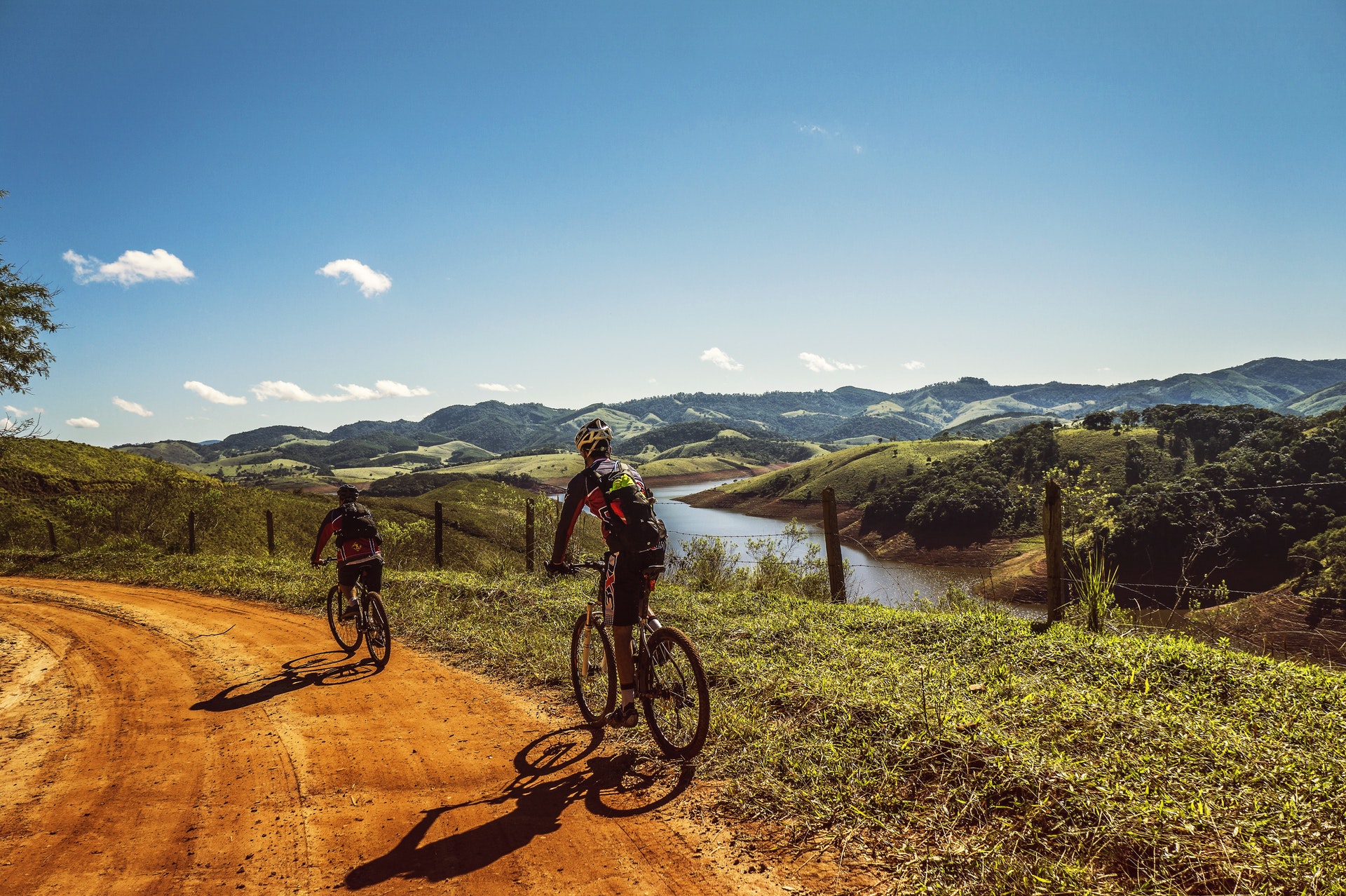 cyclists-trail-bike-clouds-163407.jpeg